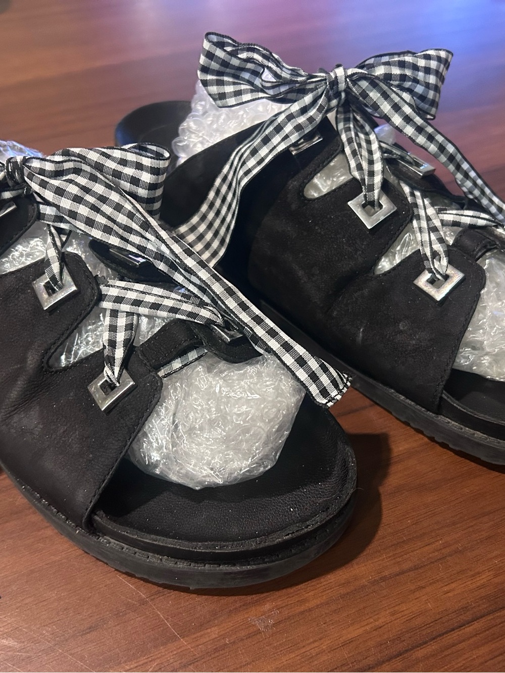 Black leather Gianni Bini sandals with Gingham Bow Laces silver grommets